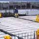 Installation process of polystyrene concrete slab on building site